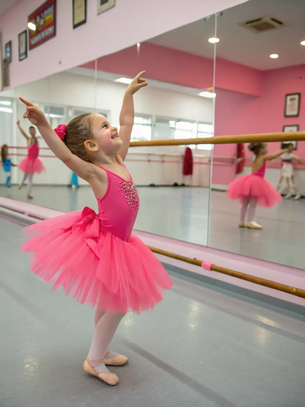 A young ballet dancer in a pink tutu gracefully executing a plié during a ballet class at ECOLE DE DANSE D’ARGENTAT, showcasing the elegance and discipline of classical ballet training.